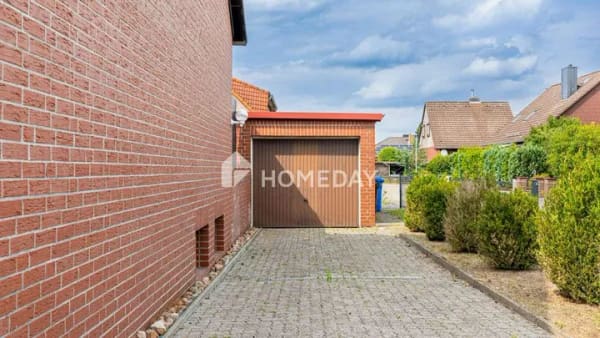 Immobilie in Sassenburg - Einladendes ZFH mit großer Terrasse, Garage, Carport und grünem Grundstück in Grußendorf - Bild 1