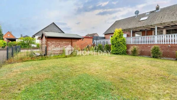 Immobilie in Sassenburg - Einladendes ZFH mit großer Terrasse, Garage, Carport und grünem Grundstück in Grußendorf - Bild 3