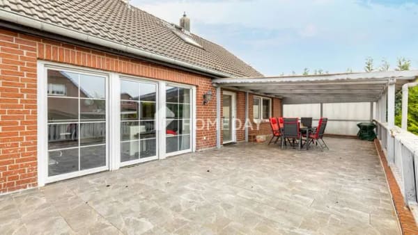Immobilie in Sassenburg - Einladendes ZFH mit großer Terrasse, Garage, Carport und grünem Grundstück in Grußendorf - Bild 4