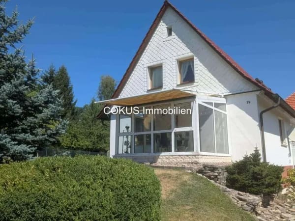 Immobilie in Breitungen/Werra - 🏡 Gepflegtes Einfamilienhaus mit beheiztem Wintergarten und neuem Bad auf 586 m² Grundstück - Bild 0