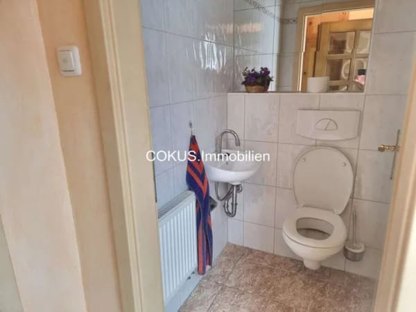 Immobilie in Breitungen/Werra - 🏡 Gepflegtes Einfamilienhaus mit beheiztem Wintergarten und neuem Bad auf 586 m² Grundstück - Bild 4