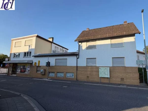 Immobilie in Kelkheim - Kelkheim-Fischbach: Wohn- und Geschäftseinheit: 4 Wohnungen & 1 Ladengeschäft, zentrale Lage - Bild 0