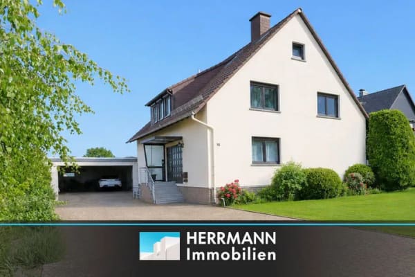 Immobilie in Hülsede - Wohnen mit Aussicht - Charmantes Zweifamilienhaus auf großzügigem Grundstück - Bild 0