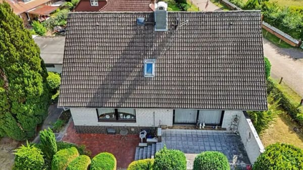 Immobilie in Hambühren - Viel Platz für Ihre Ideen – Einfamilienhaus auf parkähnlichem Grundstück - Bild 1