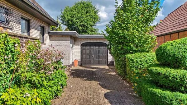 Immobilie in Hambühren - Viel Platz für Ihre Ideen – Einfamilienhaus auf parkähnlichem Grundstück - Bild 4