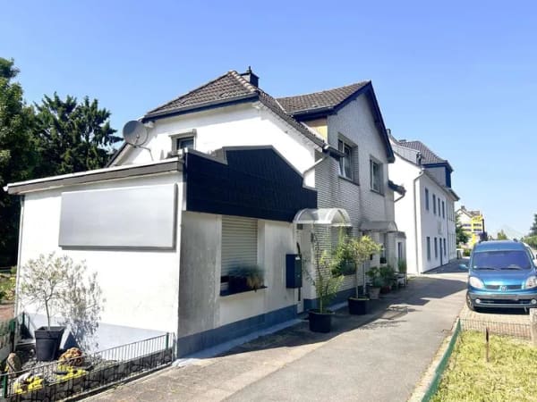 Immobilie in Wesel - Zwei gut vermietete Wohneinheiten unter einem Dach - Attraktive Kapitalanlage in Wesel-Büderich - Bild 1