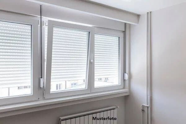 Immobilie in Biblis - 4-Zimmer-Wohnung nebst Terrasse und 2 Stellplätzen - Bild 0