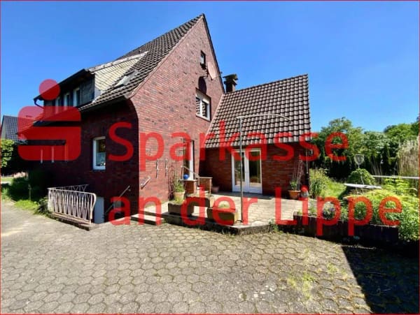 Immobilie in Werne - Werne-Stockum: Ein- oder Zweifamilienhaus mit traumhaftem Sonnengrundstück in ruhiger Lage - Bild 0