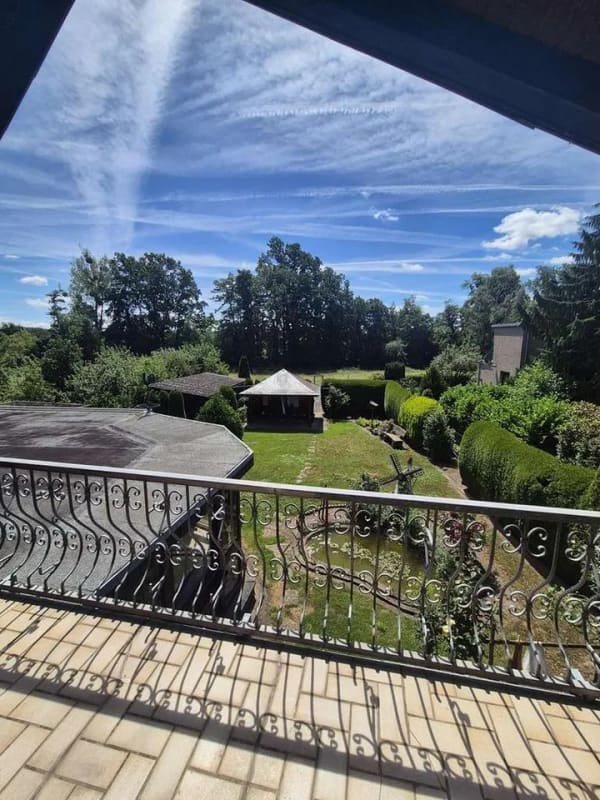 Immobilie in Bückeburg - Charmantes Einfamilienhaus mit traumhaftem Südgarten, Wintergarten und Doppelgarage - Bild 1