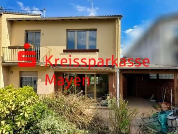 Immobilie in Kruft - Familienfreundliche Doppelhaushälfte mit Garten, Terrasse und Garage - Bild 0