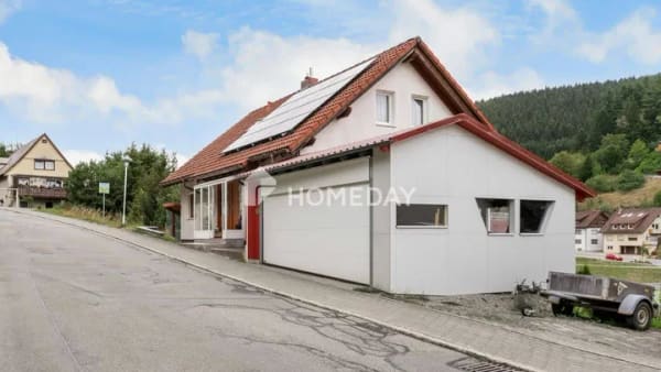 Immobilie in Vöhrenbach - Mehr Raum für gemeinsame Wohnideen: Familienhaus in Hanglage mit Einliegerwohnung - Bild 1