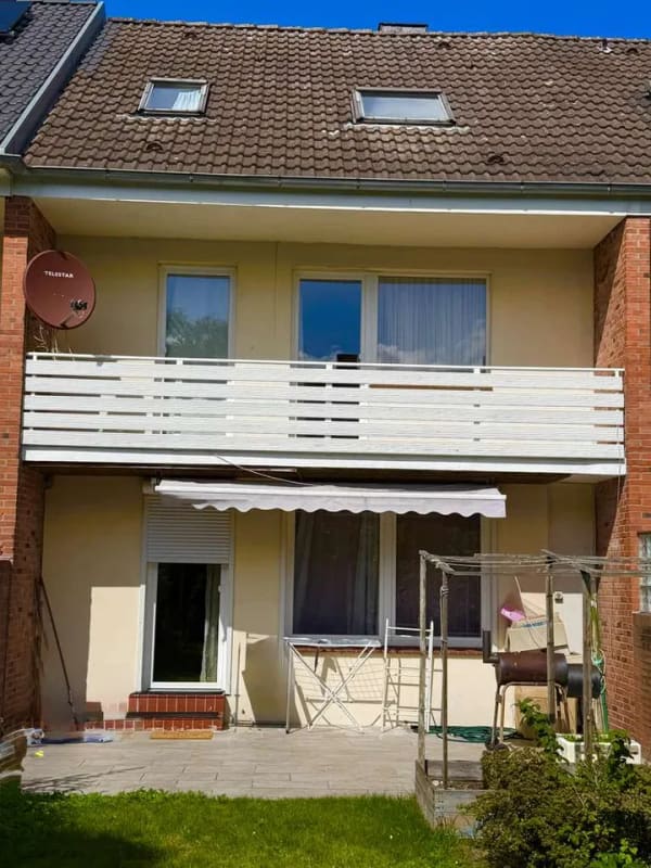 Immobilie in Rendsburg - Vermietetes, teilmodernisiertes Reihenhaus mit Garten in ruhiger und dennoch innenstadtnaher Lage! - Bild 1