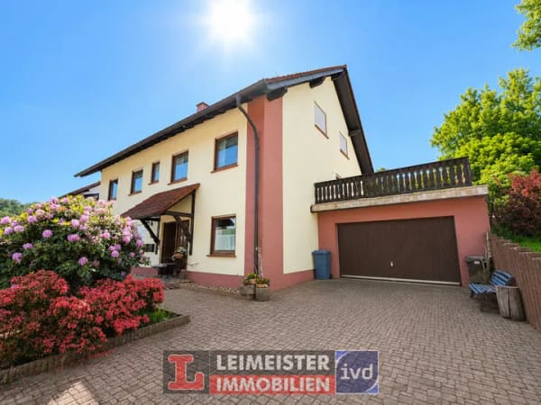Immobilie in Krombach - NEU! Tolles Einfamilienhaus in Krombach – Wohnen direkt in der Natur - separate Einliegerwohnung! - Bild 1