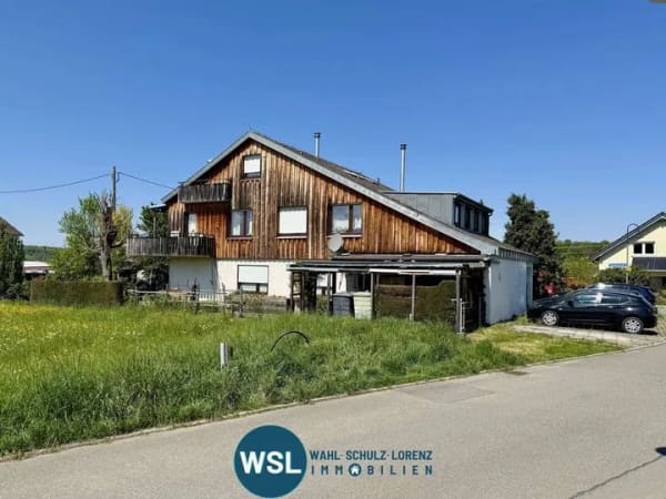 Immobilie in Bempflingen - Stattliches 3-Familienhaus mit 2 Garagen und schönem Garten in ruhiger Ortsrandlage von Bempflingen. - Bild 1