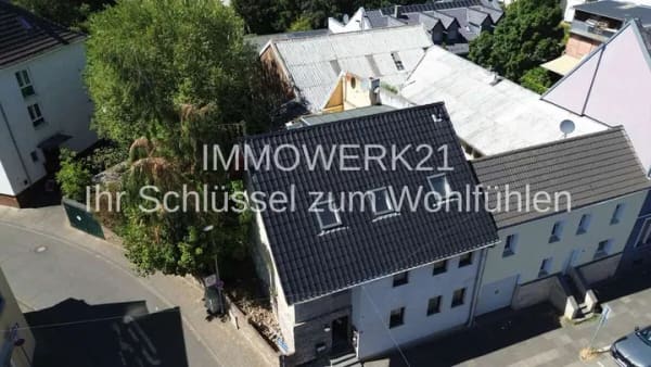 Immobilie in Euskirchen - stillvolles 3- Parteienhaus in zentraler Lage/großes Grundstück - Bild 2