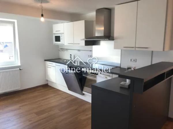 Immobilie in Rietheim-Weilheim - Mehrfamilienhaus - 5 Wohnungen u. 2 Garagen - Bild 2