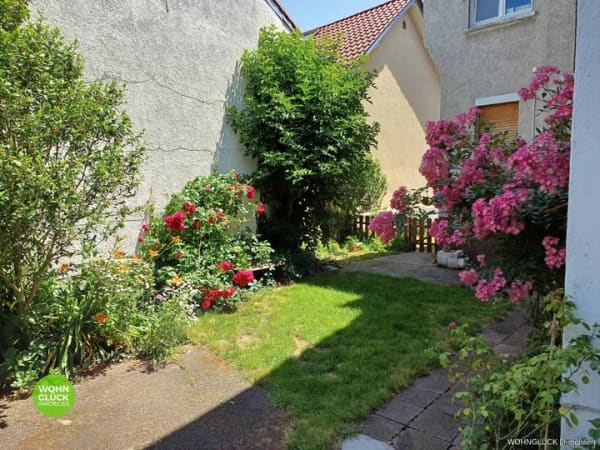 Immobilie in Hagenburg - Sanierungsbedürftiges Zweifamilienhaus in bester Lage Hagenburgs mit Garage und Garten - Erbbau! - Bild 4