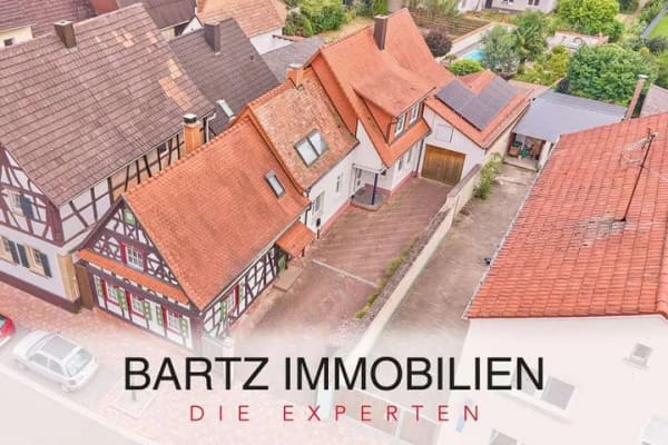 Immobilie in Bellheim - Vielseitiges Wohnensemble mit zwei Eingängen & traumhaftem Garten mit großem Pool - Bild 0