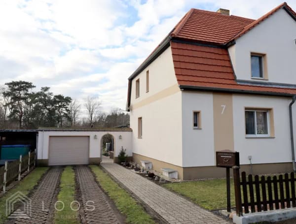 Immobilie in Sallgast - Wald vor der Tür: Sanierte DHH mit Garten, Terrasse und Nebengebäude - Bild 1
