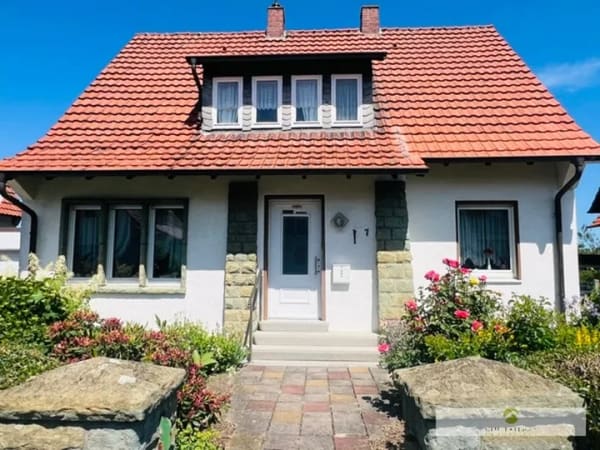Immobilie in Werl - Charmantes Einfamilienhaus mit vielseitigen Nutzungsmöglichkeiten in ruhiger Lage von Werl-Büderich! - Bild 0
