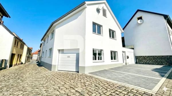 Immobilie in Dingelstädt - Teilsaniertes EFH in zentraler Lage mit 2 Garagen - Bild 0