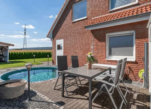 Immobilie in Auetal - Traumhafte ETW in Rehren mit sensationellem Ausblick auf das Auetal & Garten mit Pool. - Bild 0