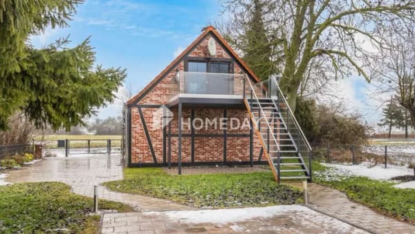 Immobilie in Saal - Wohnen auf zwei Ebenen – Einfamilienhaus mit Balkon, Terrasse und Garten - Bild 1