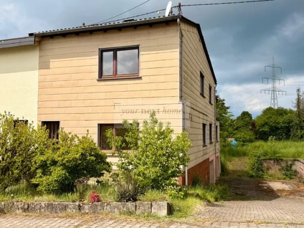 Immobilie in Schiffweiler - Doppelhaushälfte auf ca. 140 m² Wohnfläche mit großem Grundstück in Schiffweiler - Bild 1