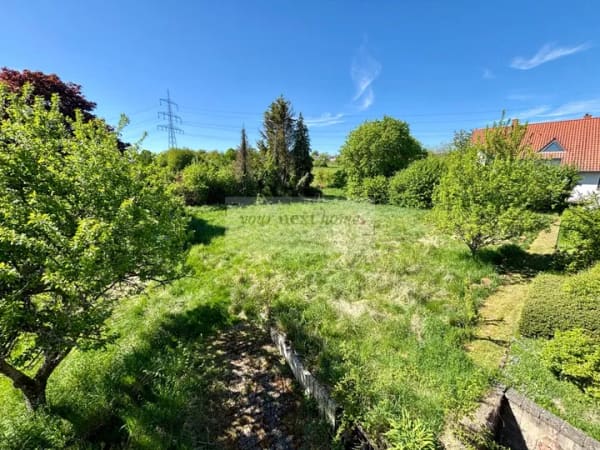 Immobilie in Schiffweiler - Doppelhaushälfte auf ca. 140 m² Wohnfläche mit großem Grundstück in Schiffweiler - Bild 3
