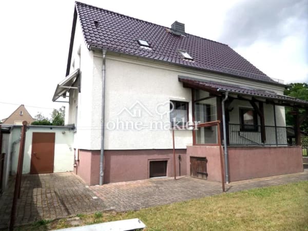 Immobilie in Lauchhammer - Unter 150.000 €: 131 m² Familienhaus mit 4 Schlafzimmern, 2 Bädern und 2 Garagen – provisionsfrei - Bild 0