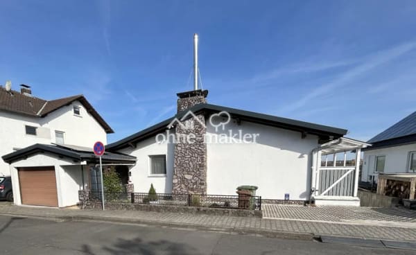 Immobilie in Hammersbach - Modernisiertes Einfamilienhaus mit PV-Anlage, Doppelgarage und viel Platz - Bild 1