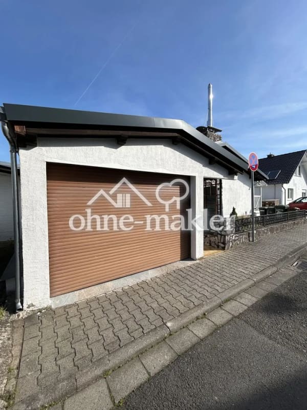 Immobilie in Hammersbach - Modernisiertes Einfamilienhaus mit PV-Anlage, Doppelgarage und viel Platz - Bild 2