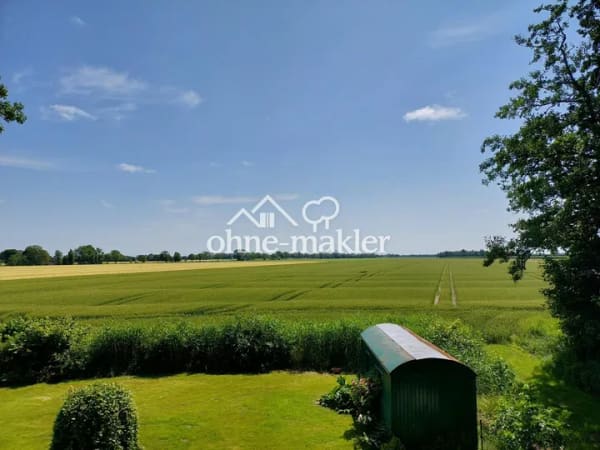 Immobilie in Oederquart - A+ Effizienzhaus mit Erdwärmepumpe, PV mit Speicher und 1.670 m² Grundstück in Außenbereichslage - Bild 1