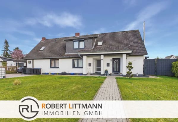 Immobilie in Hambergen - Zweifamilienhaus mit großem Garten und Wärmepumpe in Hambergen - Bild 0