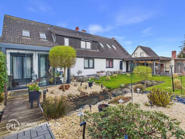 Immobilie in Hambergen - Zweifamilienhaus mit großem Garten und Wärmepumpe in Hambergen - Bild 1