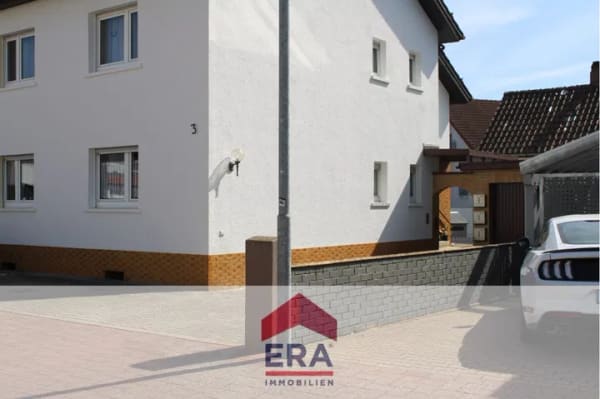 Immobilie in Sandhausen - VERKAUFT!!Komfortables Mehrfamilienhaus mit drei Wohneinheiten in ruhiger Lage von Sandhausen - Bild 2