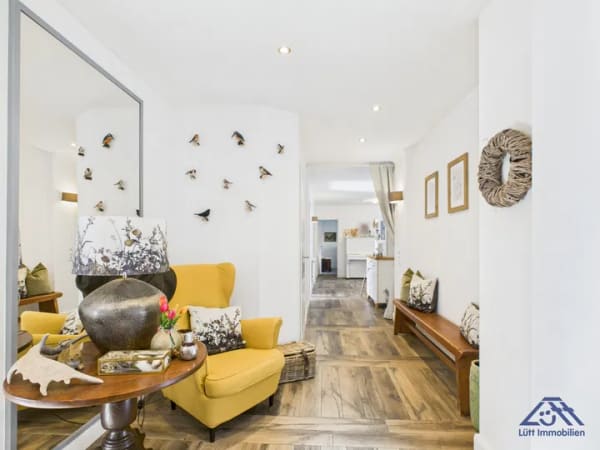 Immobilie in Bönebüttel - Einfamilienhaus mit Einliegerwohnung zum Kauf in 24620 Bönebüttel | Lütt Immobilien Kiel | Provisionsfrei für Kaufende - Bild 1