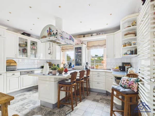Immobilie in Bönebüttel - Einfamilienhaus mit Einliegerwohnung zum Kauf in 24620 Bönebüttel | Lütt Immobilien Kiel | Provisionsfrei für Kaufende - Bild 2