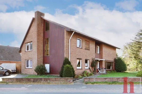 Immobilie in Steinfeld - Vollvermietetes Zweifamilienhaus auf großzügigem Grundstück in Steinfeld - Bild 1