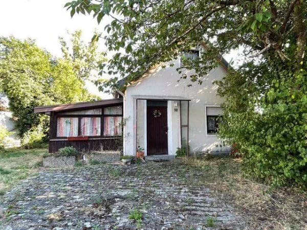 Immobilie in Trossingen - Bungalow mit großem Garten und vier Garagen - Bild 0