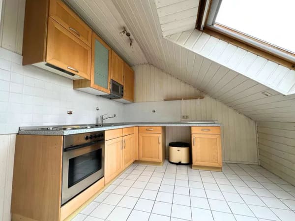 Immobilie in Ober-Olm - Großzügige Dachgeschosswohnung mit Westbalkon und Weitblick in Ober-Olm - Bild 2
