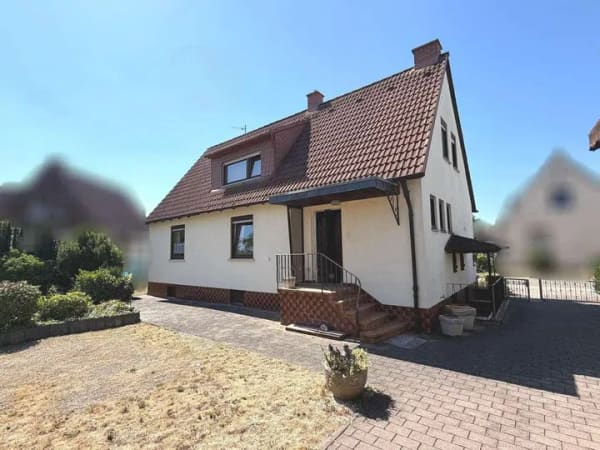 Immobilie in Biblis - Freistehendes Einfamilienhaus mit großzügigem Garten! - Bild 1