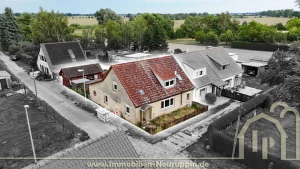Immobilie in Temnitztal - Doppelhaushälfte mit Terrasse und Garage in ländlicher Lage von Küdow, sanierungsbedürftig - Bild 0