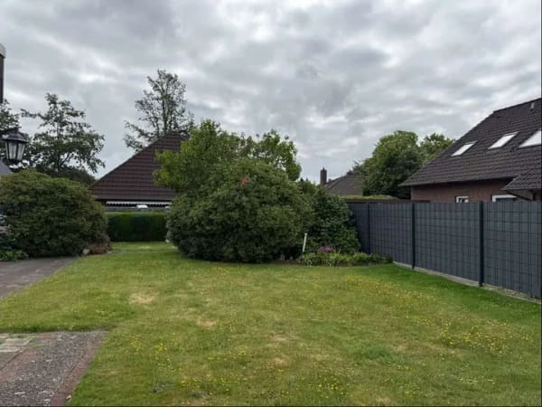 Immobilie in Delmenhorst - Einfamilienhaus mit Einliegerwohnung, großer Garage, Stellplatz und schönem Garten - Bild 4