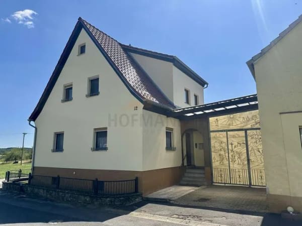 Immobilie in Oerlenbach - 2-Familienhaus in Ebenhausen, große Werkstatt, 2 Garagen, schöner Garten, herrl. Ortsrandlage - Bild 0