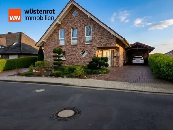 Immobilie in Esterwegen - Traumhaus mit idyllischem Garten & Teich – 208 m² Wohnkomfort zum Verlieben - Bild 1