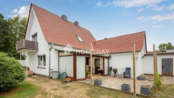 Immobilie in Harpstedt - Charmantes Einfamilienhaus mit Wintergarten, Kamin, Garten & moderner Technik in Harpstedt  - Bild 1