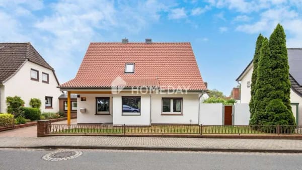 Immobilie in Harpstedt - Charmantes Einfamilienhaus mit Wintergarten, Kamin, Garten & moderner Technik in Harpstedt  - Bild 2