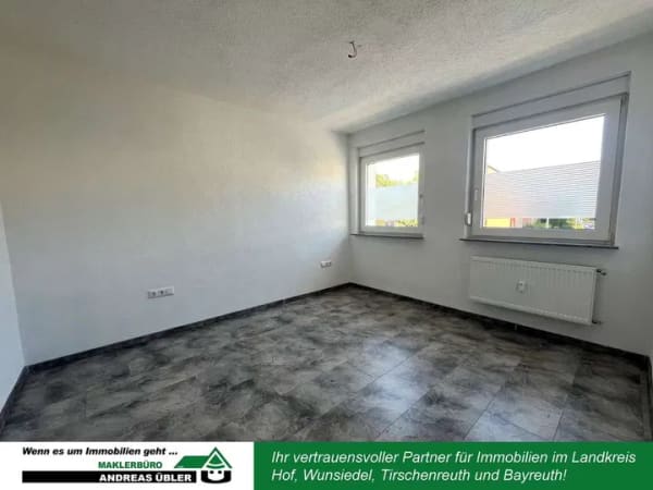 Immobilie in Hof - Moderne 2-Zimmer-Wohnung mit Garten und Garage in Hof - Bild 1
