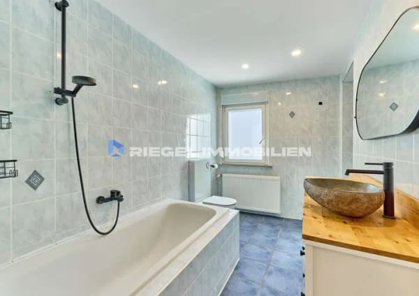 Immobilie in Dudenhofen - Sie hier? Wir auch! Gepflegte Erdgeschoss-Wohnung mit 3 Zimmern und Außen-Stellplatz - Bild 2